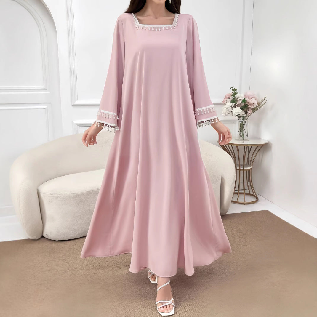 Kvinne Elegant Maxi Kjole med Dekorative Frynser og Brede Ermer Skjora