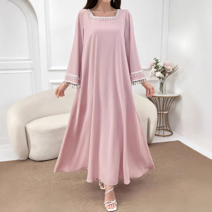 Kvinne Elegant Maxi Kjole med Dekorative Frynser og Brede Ermer Skjora