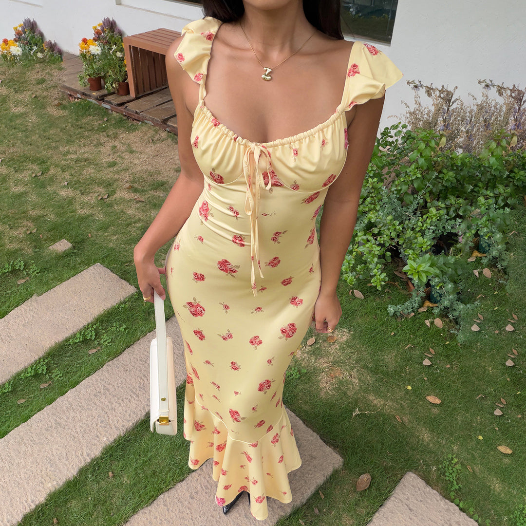 Dame maxi kjole med blomstrete volanger og elegant snitt Skjora