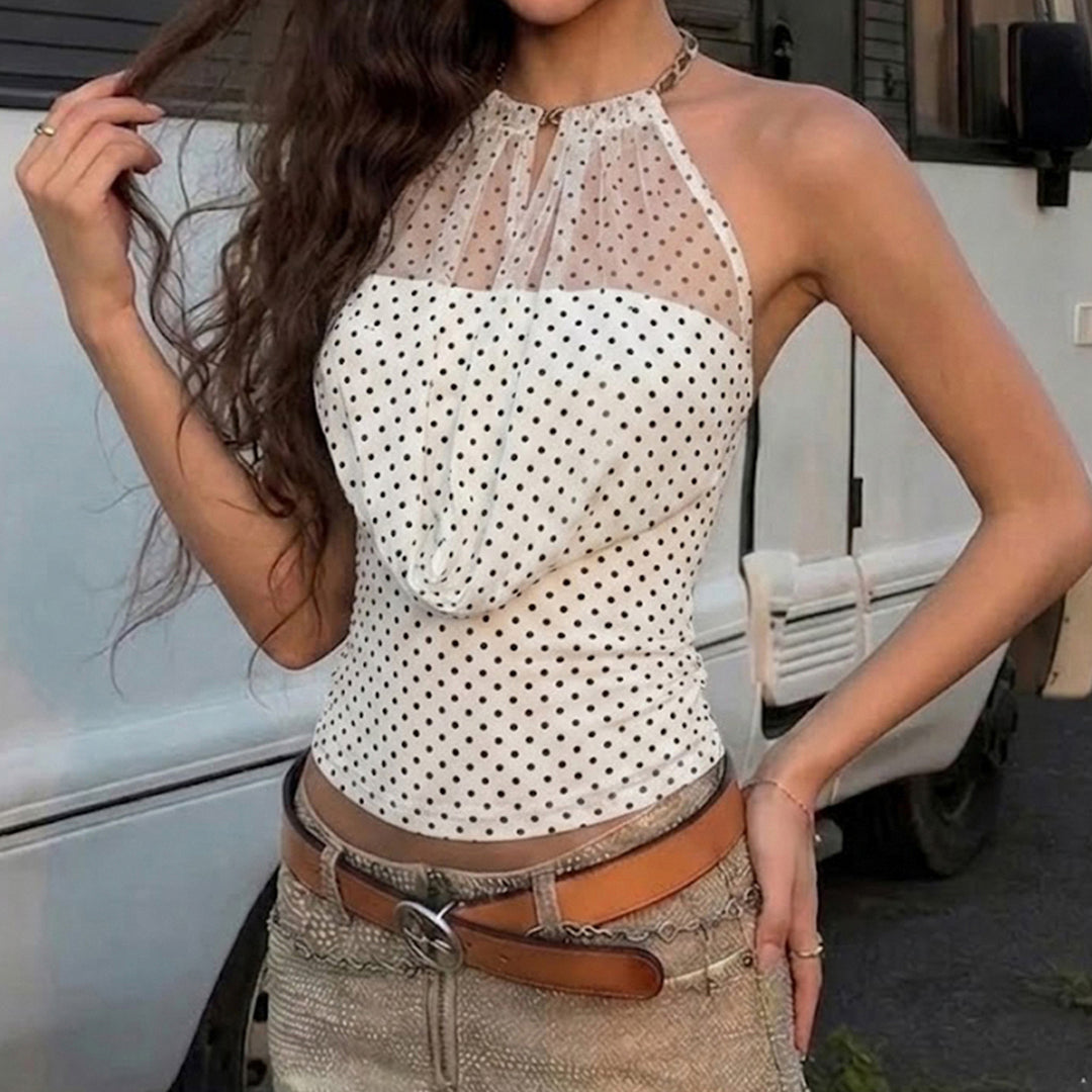 Dame Elegant Halterneck-Topp med transparente aksenter og lekent prikkemønster Skjora