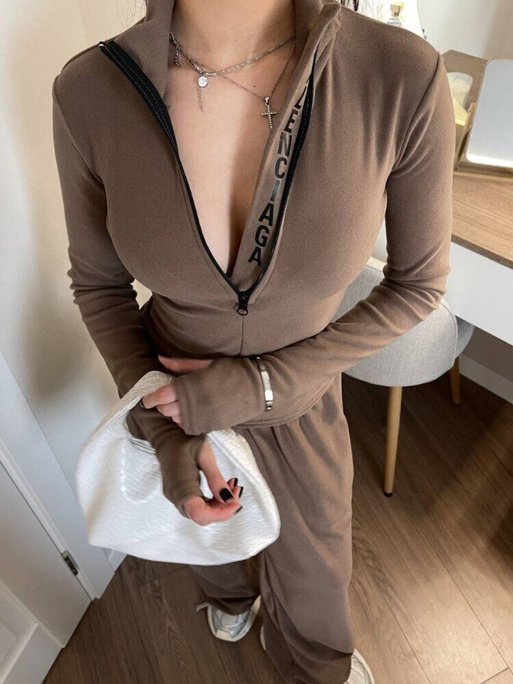 Dame joggedress med moteriktig glidelås og lange ermer Skjora