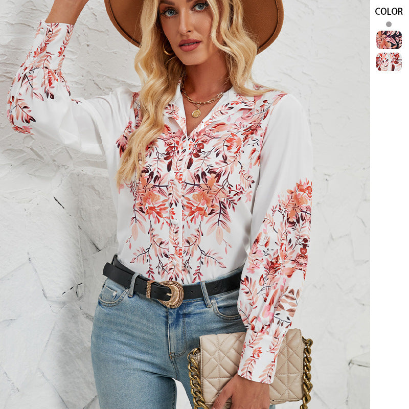 Kvinnenes elegante bluse med blomstermønster og voluminøse ermer