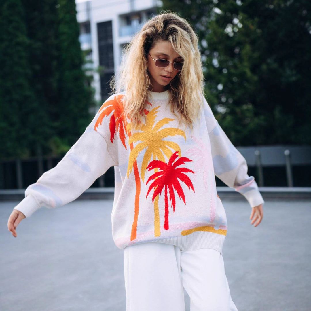 Dame Urban Genser med iøynefallende palm design Skjora