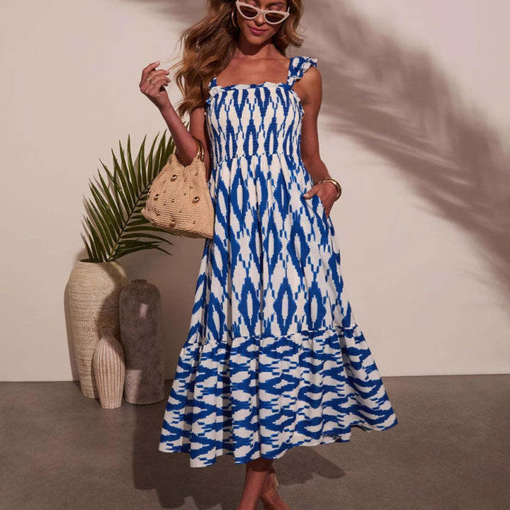 Kvinne maxi kjole med av- skulder design og elegant volang kant