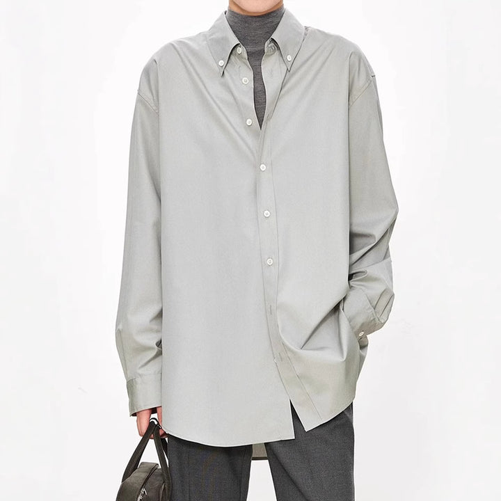 Damer elegant oversized bluse med klassiske knappedetaljer Skjora
