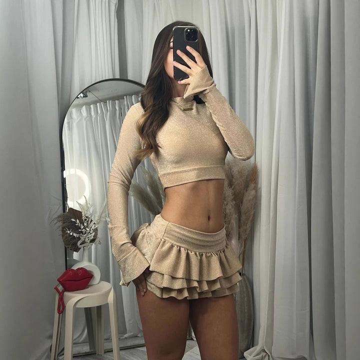 Kvinnenes moteriktige crop top og plisserte mini skjørt sett Skjora