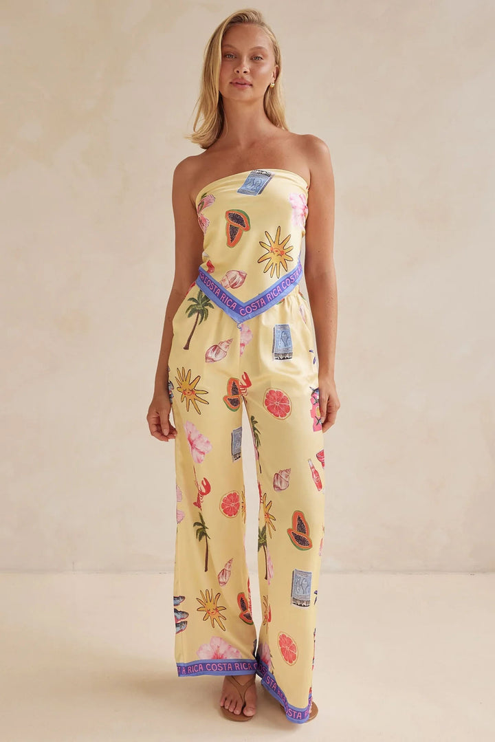 Kvinnens jumpsuit med lekne tropiske mønstre og elastisk topp Skjora