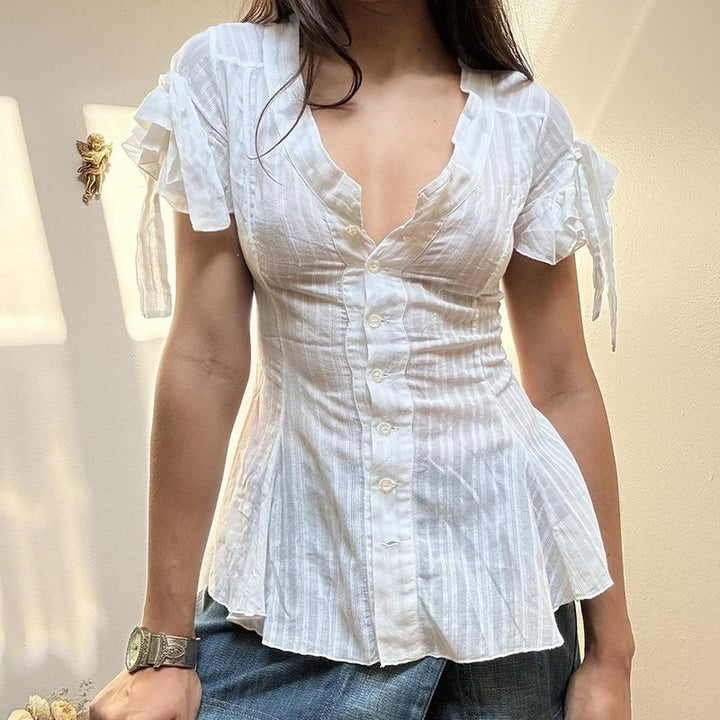 Dame Blusenshirt med moderne snitt og volangdetaljer Skjora