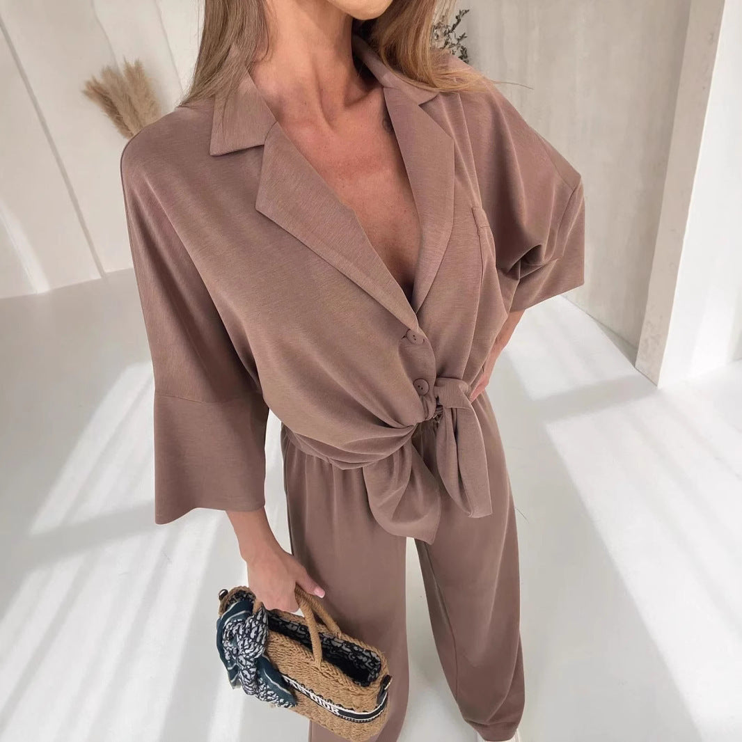 Kvinnelig elegant omslags jumpsuit med knappedetaljer Skjora