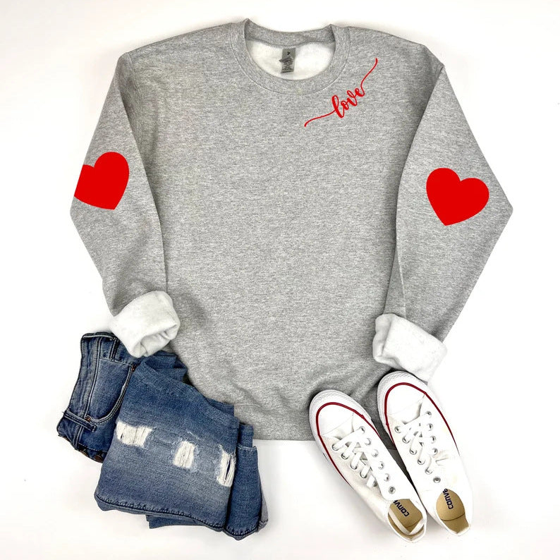 Dame sweatshirt med hjerte design og avslappet passform Skjora