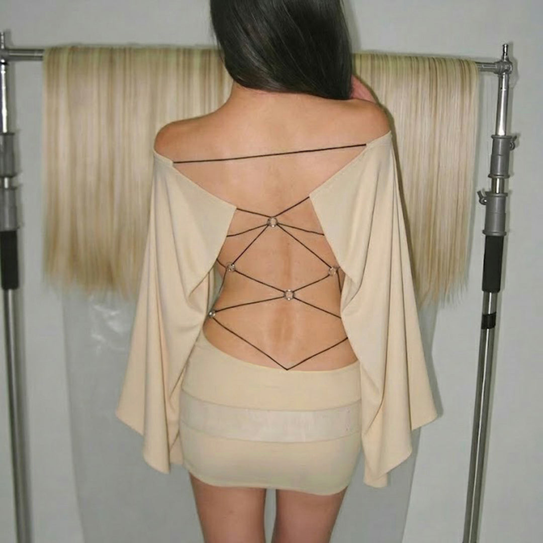 Damekjole med off-shoulder-design og raffinerte cut-out-detaljer Skjora