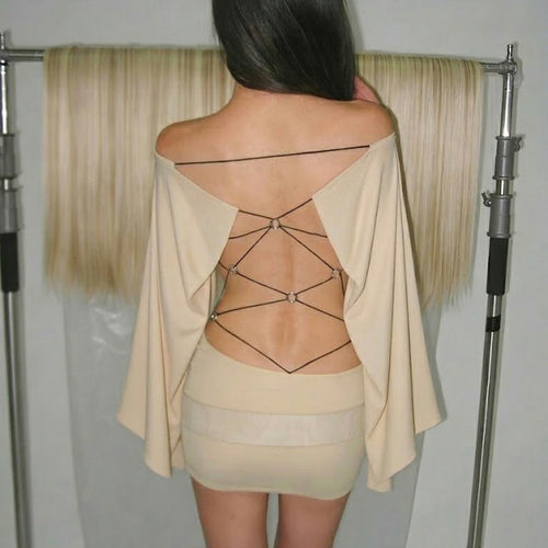 Damekjole med off-shoulder-design og raffinerte cut-out-detaljer Skjora