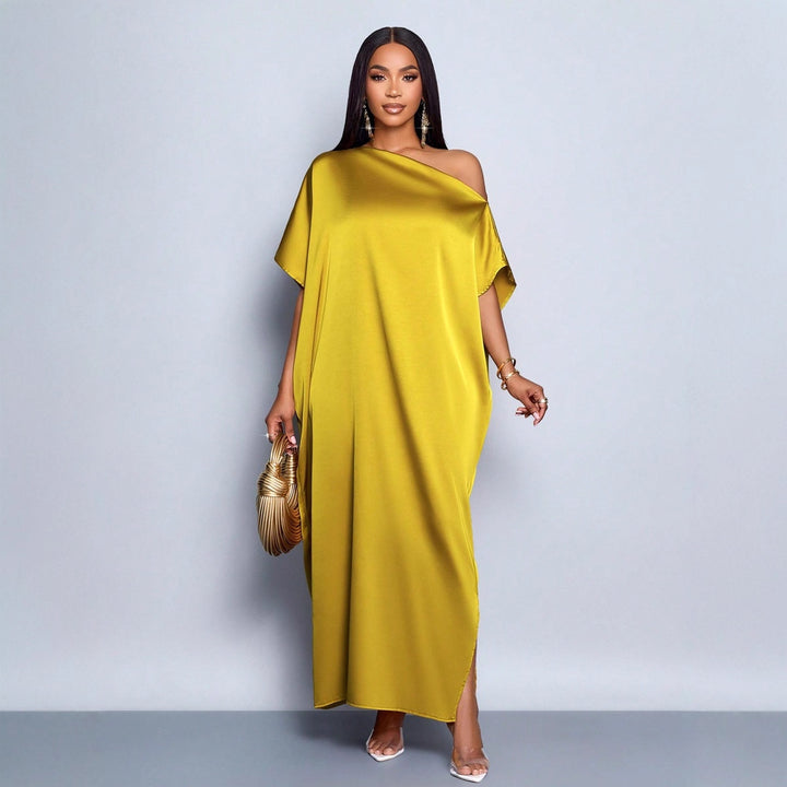 Dame maxikjole med asymmetrisk snitt og elegant fall Skjora