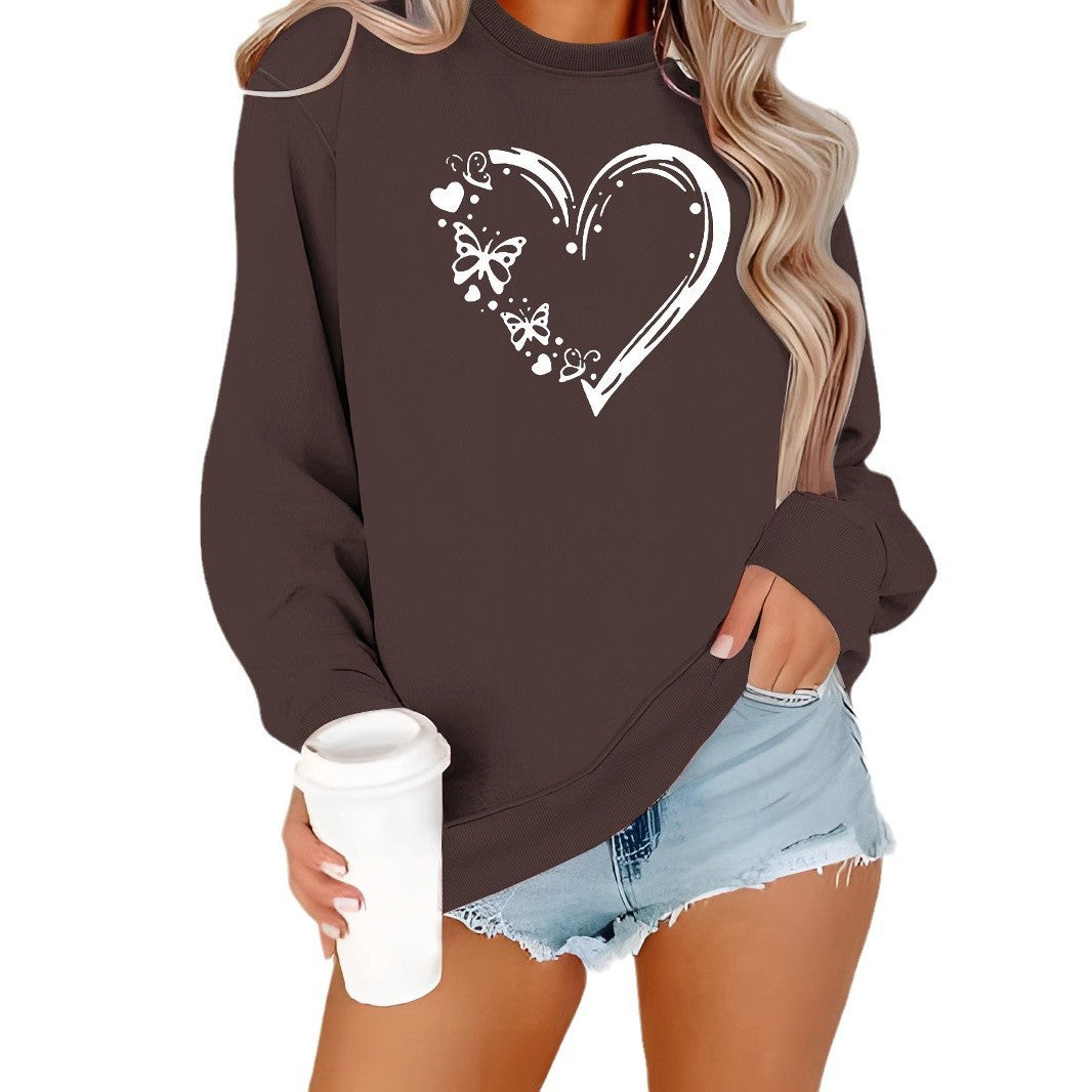 Dame sweatshirt med kreativt hjerte- og sommerfugl-design Skjora