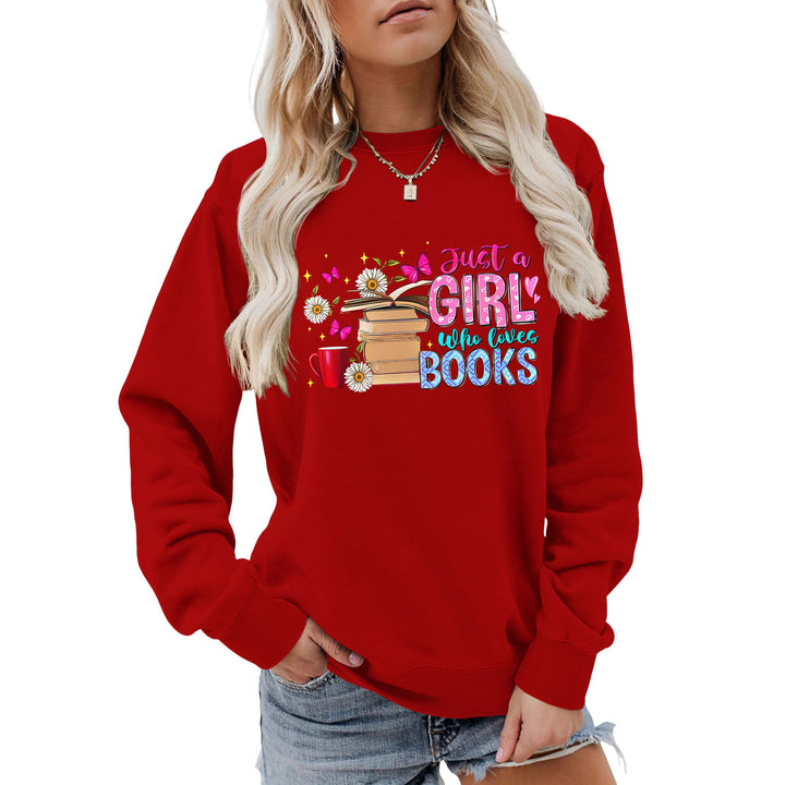 Dame sweatshirt med iøynefallende bokmotiv og ledig passform Skjora