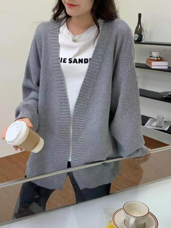 Kvinnens avslappede strikk cardigan med oversized snitt og spesielle teksturer Skjora