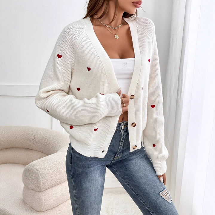Dame cardigan med hjerteapplikasjoner og knappelukking Skjora