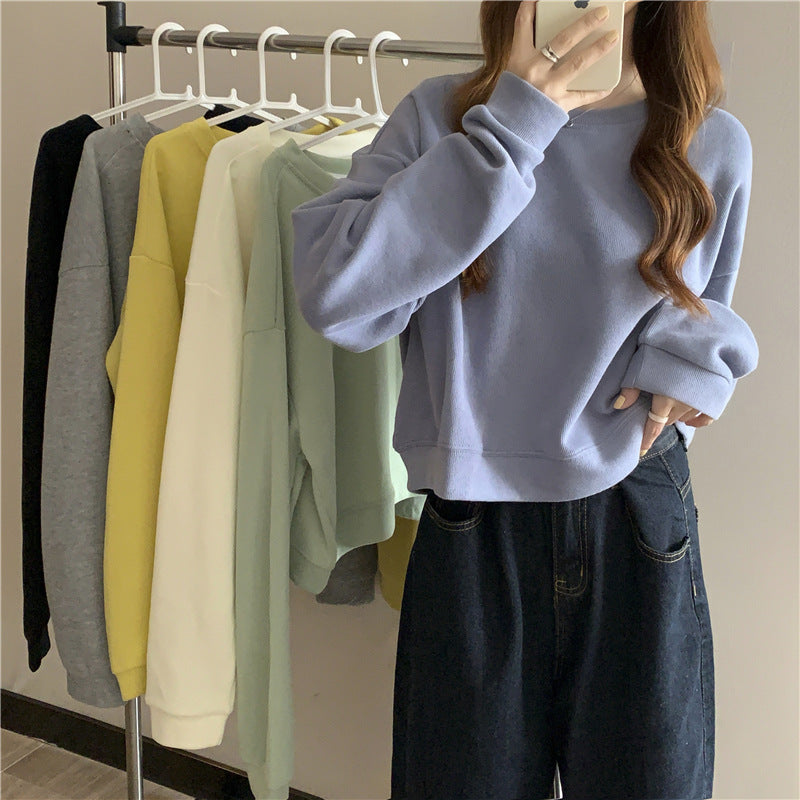 Kvinne casual cropped genser laget av myk bomullsblanding med stilren rund hals Skjora