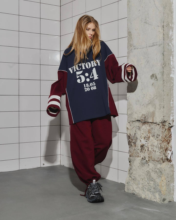 Kvinne Oversized Treningsdrakt med Grafisk Trykk og Bred Bukse Skjora