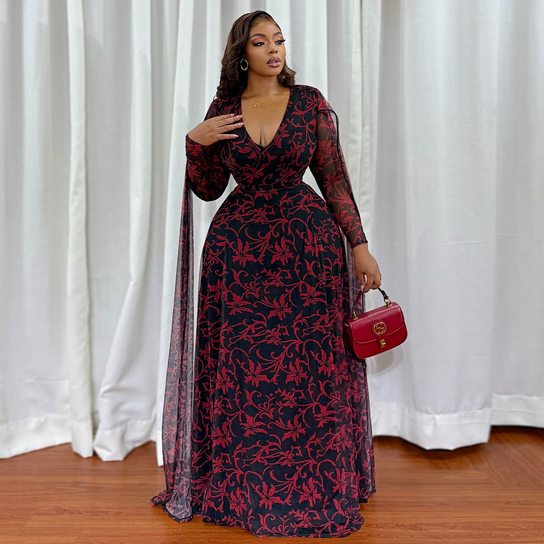 Kvinne maxi kjole med blomstrende transparent design og elegante ermer Skjora