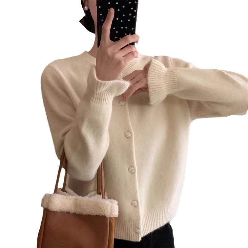 Dame koselig cardigan med elegant perleknappelukking Skjora
