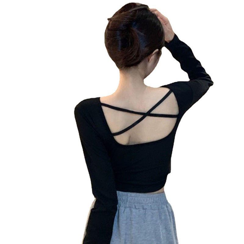 Kvinne langermet crop top med kryssrygg og elegant V-hals