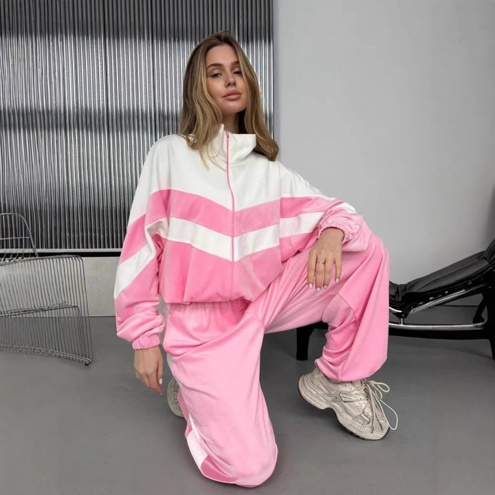 Dames sportieve fleece sweatshirt en joggingsbroek set met hoge staande kraag en contrasterende strepen Skjora