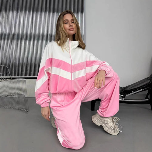 Dames sportieve fleece sweatshirt en joggingsbroek set met hoge staande kraag en contrasterende strepen Skjora