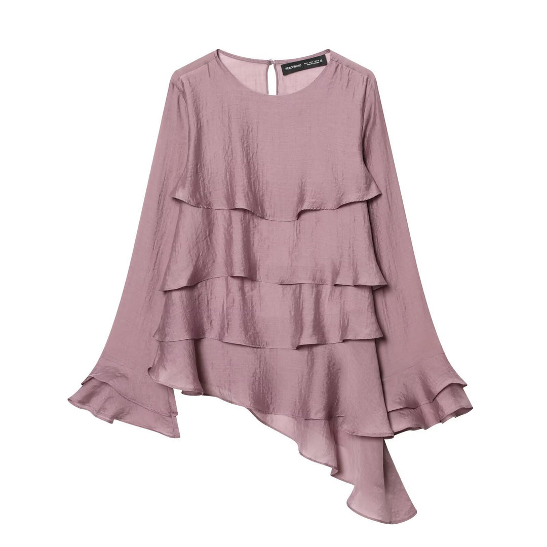 Dame asymmetrisk bluse med volangdetaljer og elegant fall Skjora