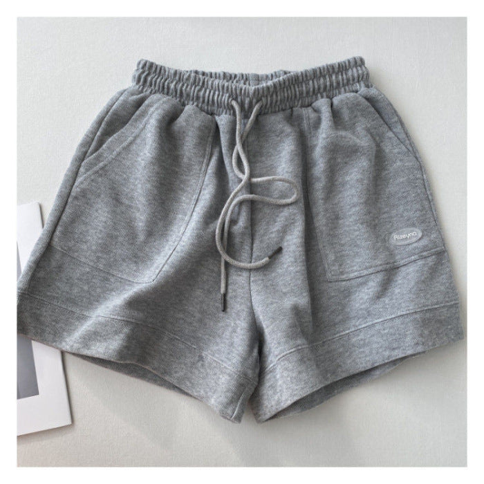 Kvinnenes casual joggeshorts med elastisk liv og praktiske sidelommer