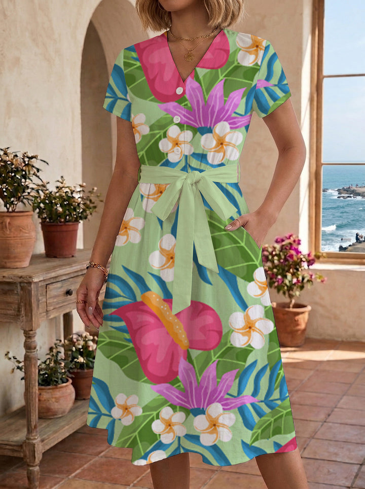 Dame Midi kjole med florale akcentuer og innsnevret snitt Skjora