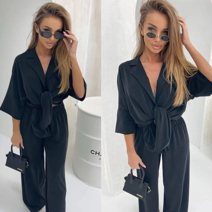 Kvinnens casual jumpsuit med belte og vide ben