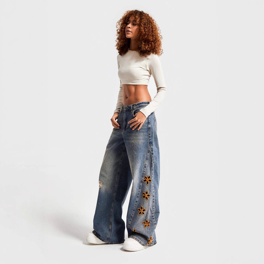 Women's wide-leg jeans with floral print Skjora