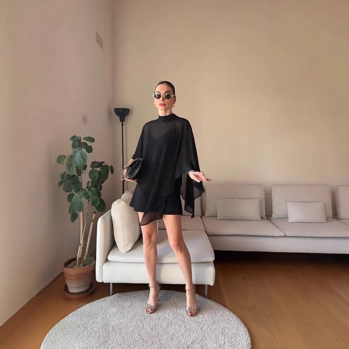 Kvinnelig elegant chiffon tunika med asymmetrisk snitt og flytende design Skjora