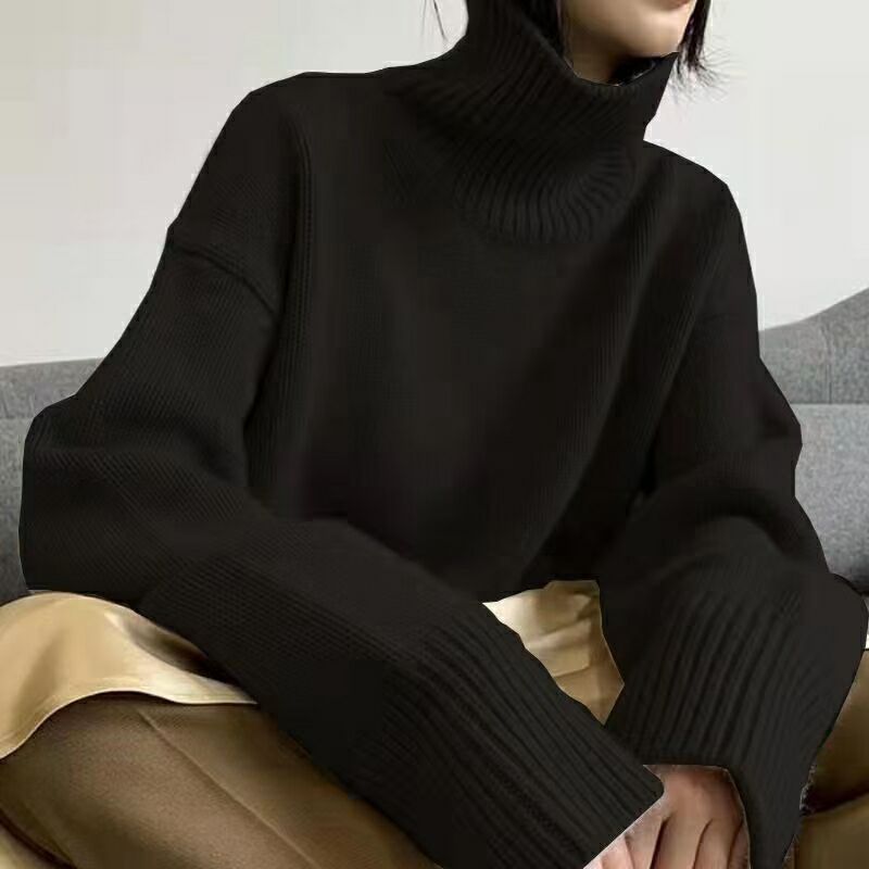 Dame moter turtleneck genser med vide ermer og ribbet struktur Skjora