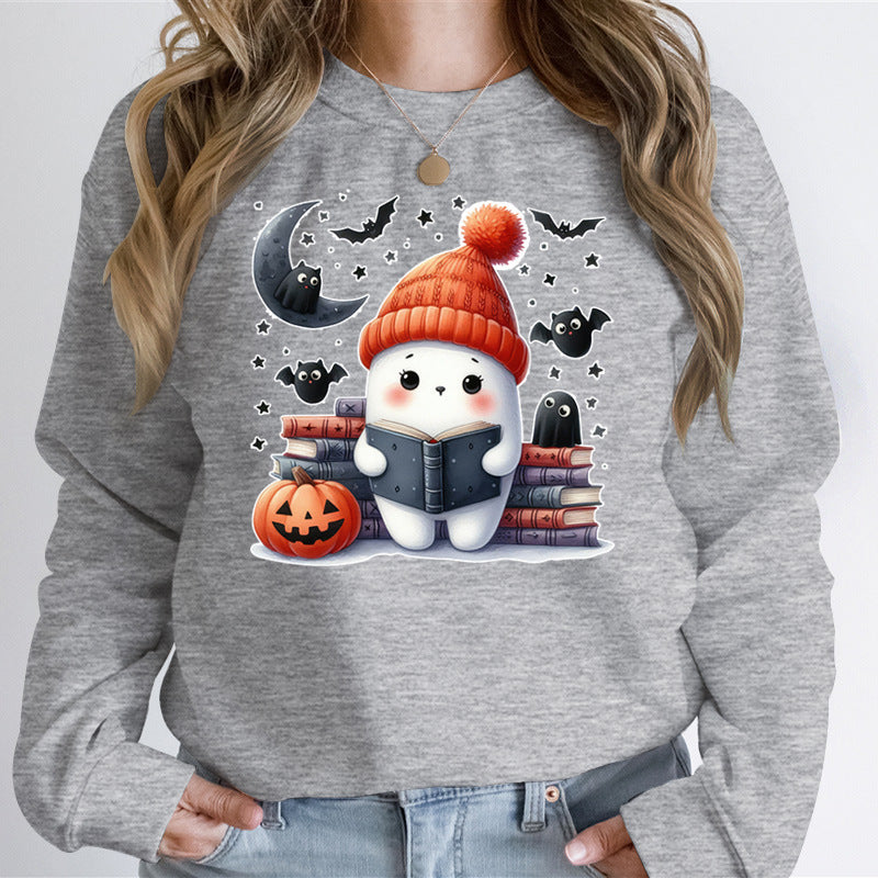 Dame sweatshirts med søtt Halloween-motiv og bokdesign Skjora