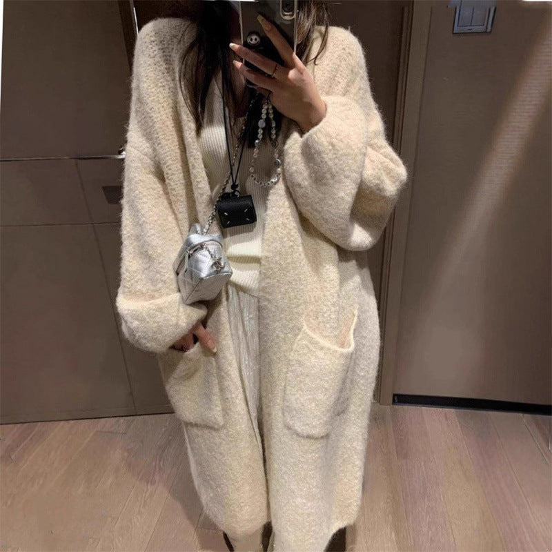 Kvinners fluffy cardigan med store lommer og løs passform Skjora