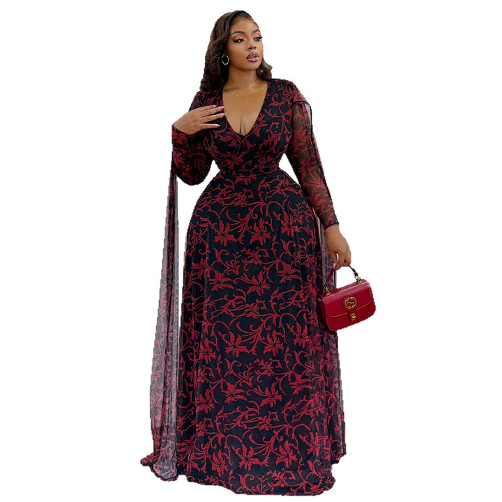 Kvinne maxi kjole med blomstrende transparent design og elegante ermer Skjora