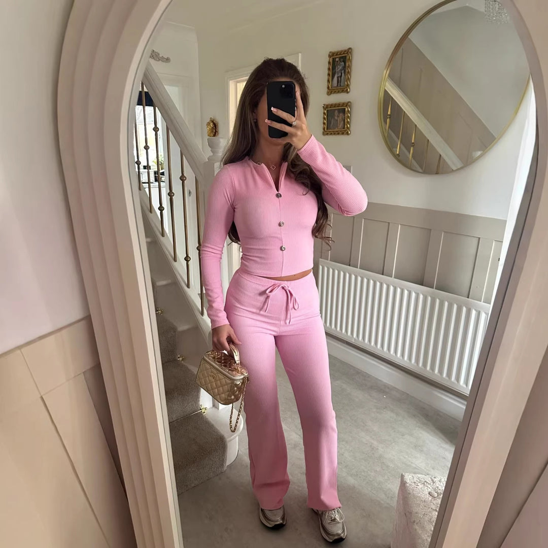 Kvinne jumpsuit med elegant knappelukking og avslappet snitt