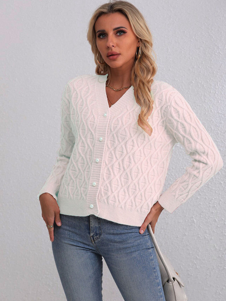 Women's designer cardigan with cable pattern and soft colors Skjora