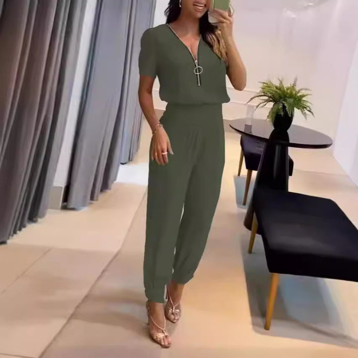Dame jumpsuit med høyhals og sidelukking Skjora