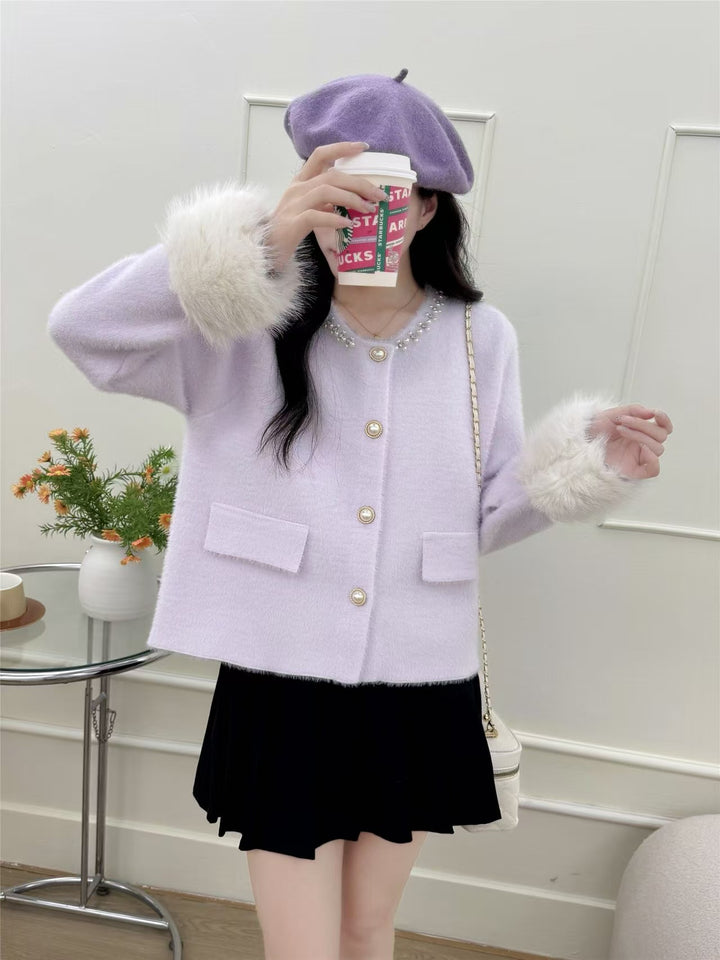 Damer elegant cardigan med perledekorasjon og fluffy ermer Skjora