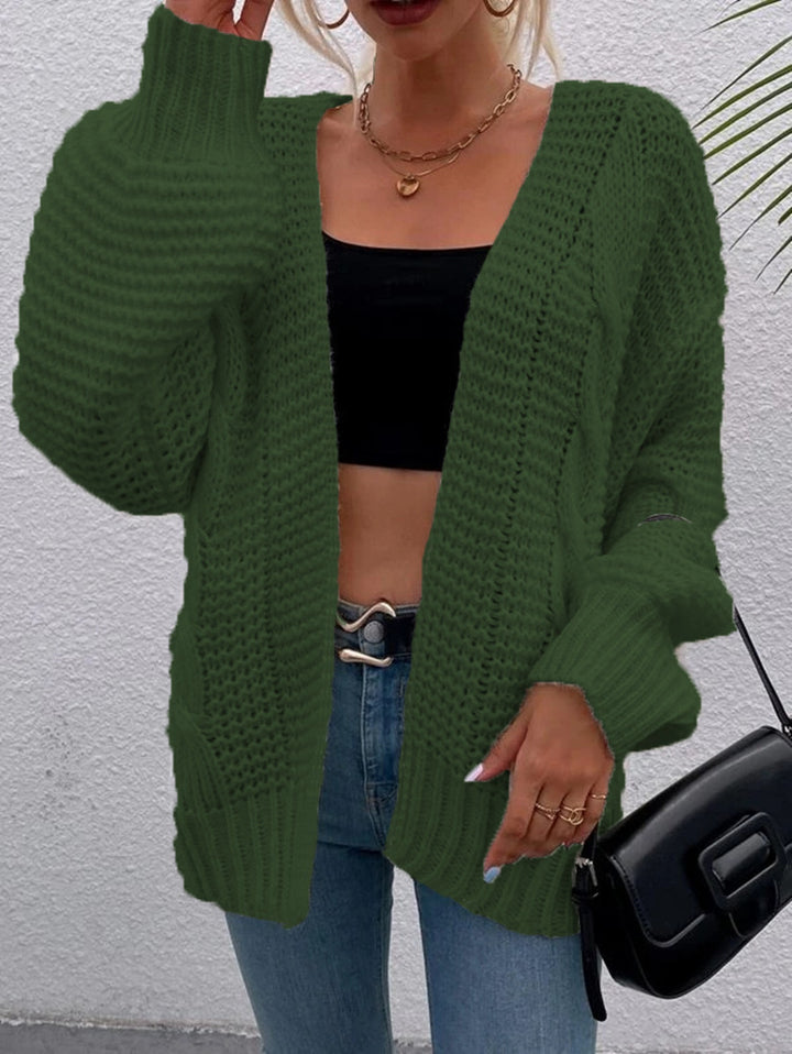 Kvinnens chunky strikket cardigan med komfortable åpne lommer og avslappet passform Skjora