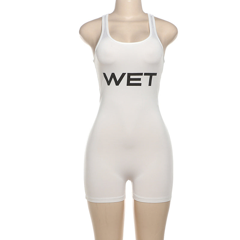 Dame Sporty jumpsuit med racerback og iøynefallende logo Skjora