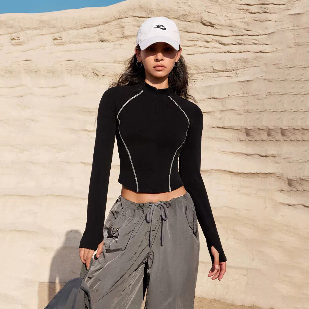 Women's Breathable Sports Top with High Collar and Thumbholes Skjora