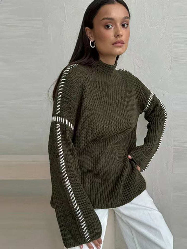 Kvinne chunky strikkegenser med høy krage og elegante erme detaljer Skjora