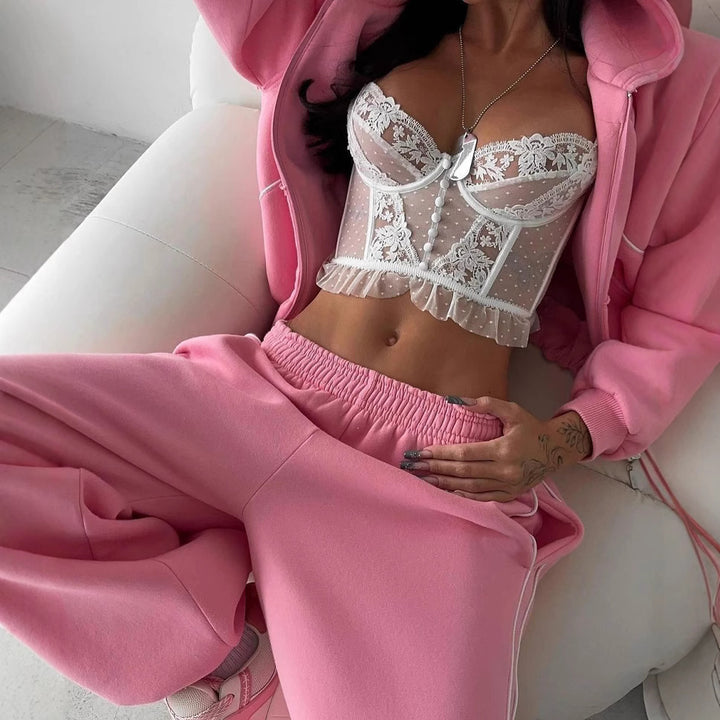 Kvinnors sportiga oversized-set i mjuk fleece med kontraststripes Skjora