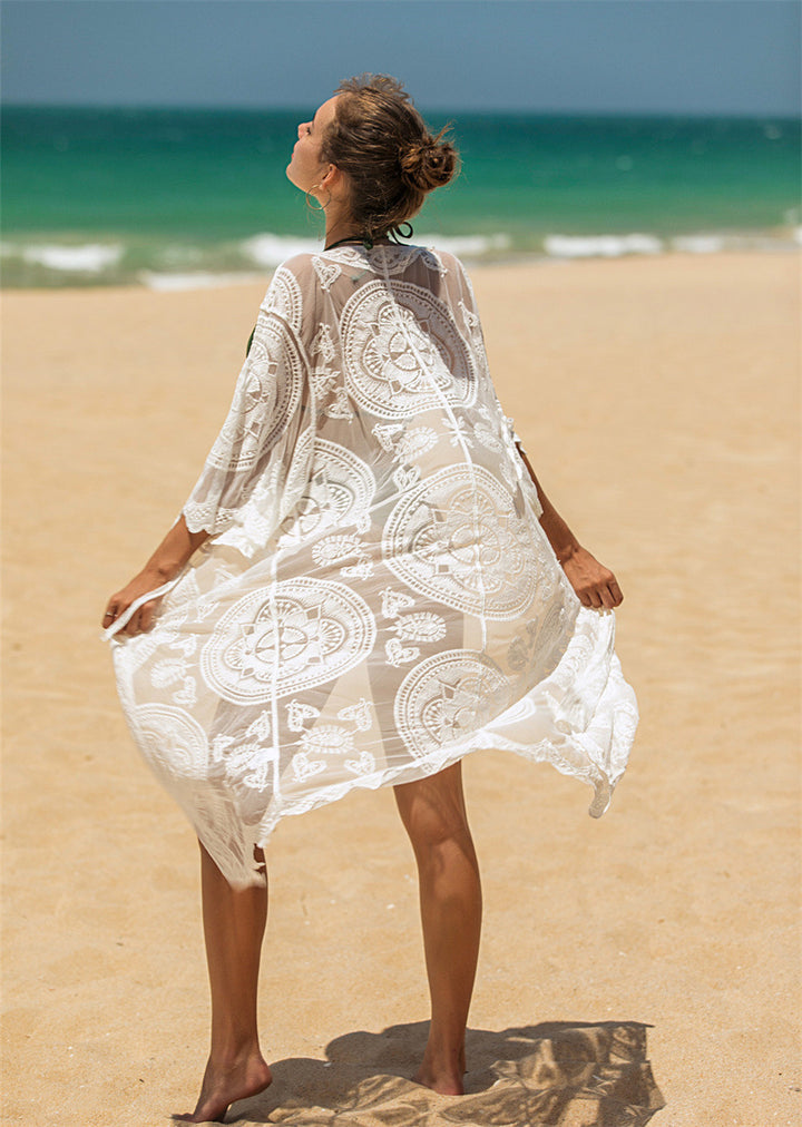 Dame elegant heklet strandtunika med florale detaljer Skjora