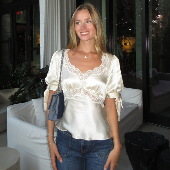 Ladies' satin blouse with pointed details Skjora