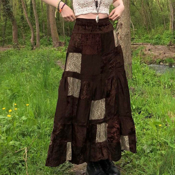 Dame maxiskjørt med florale patchwork-mønstre og voluminøs kant Skjora